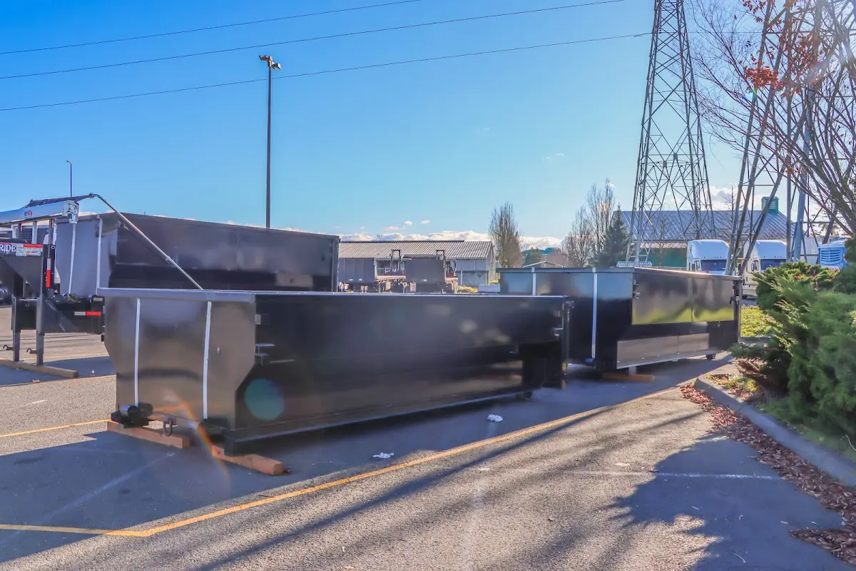 Roll-off dumpster ready for waste disposal at job site for Construction Dumpster Rental in Huntington Woods
